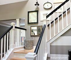 Black And White Stair Railing Ideas Nesting In The Entry Creating Ambience With A Beaded Crystal Chandelier Staircase Makeover Black Stair Railing Staircase Design