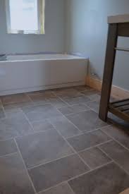 Penny round tiles for your kitchen or bathroom project, floor design or penny tile backsplash. Why I Love Sheet Vinyl And Other Barn Apartment Updates Newlywoodwards