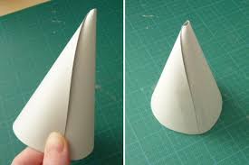 Make sure you place them low enough so that you won't be seeing styrofoam peeking out underneath them. Pom Pom Christmas Tree Tutorial Planetjune By June Gilbank Blog