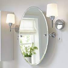 This shapely, beveled mirror features a narrow frame finished in lightly distressed bronze with burnished details. Pin On Abbey Bathroom