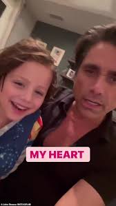 John Stamos tries to tell his son Billy, three, a story after sharing a  loving tribute to Bob Saget
