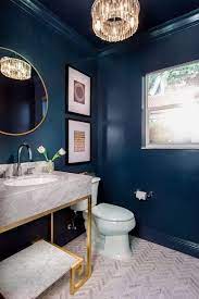 Join the decorpad community and share photos, create a virtual library of inspiration photos, bounce off design ideas with fellow members! Navy Walls Make This Powder Room Shine Gold And Marble Vanity Chevron Tiles Gold Mirror And Chrome Faucets Blue Powder Rooms Blue Bathroom Powder Room Decor