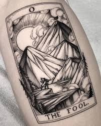This collaborative project brings 78 tattoo artists together to create a unique collection for those who love tarot cards, tattoos, and art! The Fool Tarot Card Best Tattoo Ideas For Men Women