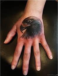 Eagle tattoo with colored splashes. 30 Cute Eagle Tattoos On Hand
