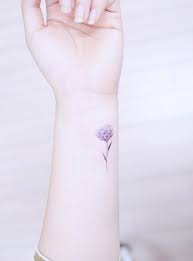 This is a fully inked sleeve and hand tattoo which features a face. Dainty Purple Flower Tattoo Novocom Top