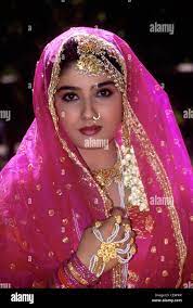 Raveena Tandon ; Indian bollywood actress model producer in red sari and  pearl jewelry ; India ; Asia Stock Photo - Alamy
