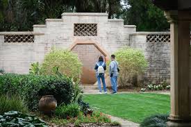 The Moongate at El Retiro was part of the original landscape design of the  estate, completed by landscape architect William Lyman Phillips of the  Olmsted firm. Walking around the surrounding gardens or