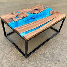 These tables are paired with ceramic table tops that are highly scratch, uv and low temperature resistant. Manta Ray Family Ocean Art River Coffee Table