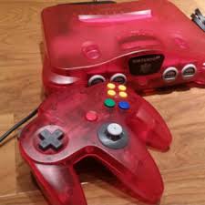This is a sharply designed midnight grey/smoke black console that measures approximately 10 1/8 x 7 1/2 x 3. Watermelon Red Funtastic Nintendo 64 From Retrogamezone On Etsy