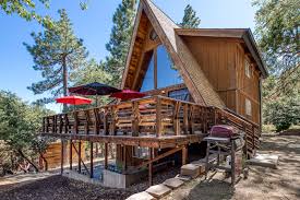 Guests can enjoy views of the nearby mountains and lily rock. Dog Friendly Cabin Rental With A Wood Burning Fireplace In Idyllwild California Dog Friendly Cabins Cabin Rentals Idyllwild