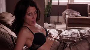 Lisa Edelstein's passionate embrace in House of Lies S02E05 - a scene of raw emotion and burning desire that will leave you spellbound