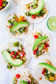 With chipotle peppers and plenty of cilantro, it's a meal your friends and family will love. White Fish Tacos With Kiwi Salsa Chipotle Lime Crema