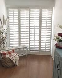 Learn about the best sliding door window coverings for your patio and glass doors. The Best Window Treatments To Cover A Sliding Glass Door Sunburst Shutters Patio Door Coverings Sliding Glass Door Treatments Patio Door Window Treatments