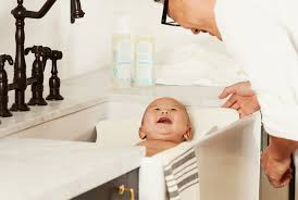 Place your baby into her bouncy or car seat and tuck a towel around her, or hand her to someone else before you get out. 10 Tips For Keeping Baby Safe