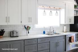 Before, the counter tops seemed to just blend in with the cabinets. Tips On Painting Kitchen Cabinets With A Paint Sprayer