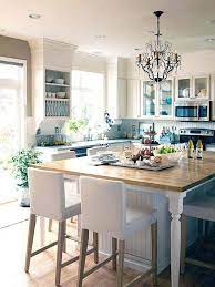 White kitchen with island, table and chairs. White Kitchens We Love Home Kitchens Kitchen Island With Seating Kitchen Remodel