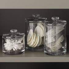These bathroom toiletry storage jars will leave your guests laughing! Glass Storage Jars For The Bathroom Glass Storage Containers Glass Bathroom Glass Storage