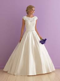 Traditional glamour with a modern twist, this this romantic lace wedding dress with cap sleeves. Pin On Wedding Dresses