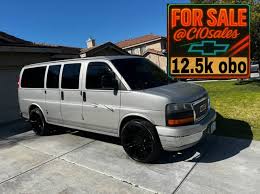 Image result for Black 2009 Savana