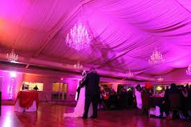 Lighting is placed throughout the venue that washes the room with color. Wedding And Event Lighting Chicago Il