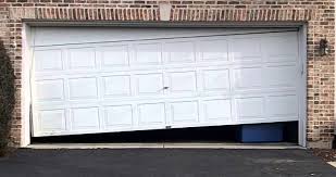 Garage Door Repair And The Causes Of Stuck Or Crooked Doors