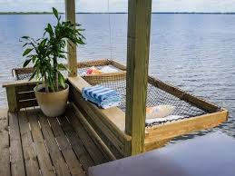 Sun rooms, living rooms, as a it's no surprise that hanging a hammock between walls or on the ceiling can be dangerous. 12 Deck Hammock Ideas Deck Hammock Hammock Dock Hammock