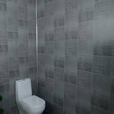 Cheaper & easier to install with tongue & groove system our range of shower panels are ideal for any bathroom, wet room or shower enclosure. Dark Grey Large Tile 5mm Pvc Wall Panels For Walls Claddtech