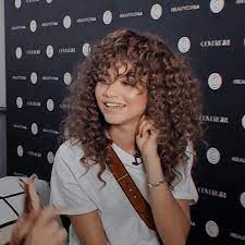 Huge 2020 Hairstyle List The 9 Hottest Trends To Be Obsessed With Ecemella Curly Hair Styles Curly Bangs Zendaya Hair