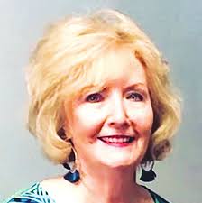 Woman rescued from burning home by son