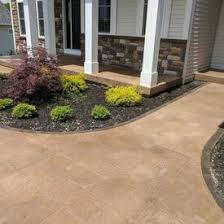 Construction of sidewalks and streetlights. Lincoln Concrete And Paving Lincoln Concrete Contractors Driveways Patios Lincoln Concrete Company