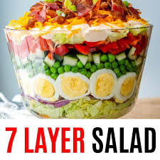 This seven layer salad is the perfect overnight salad! 7 Layer Salad Real Housemoms