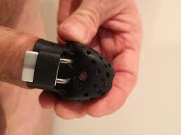 penicap frenum short model fixed on a frenum piercing a chastity cage for men with a frenum piercing