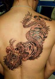 170 Dragon Tattoo Sinnvolle Ideen Inspirationen Tattoo Ideen Tiger Tattoo Design Tiger And Dragon Tattoo Tiger Tattoo Sleeve
