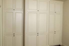 This diy rolling garage shelf unit is the custom garage shelving solution you've been looking for at a fraction of the cost of your retail options. Custom Garage Cabinets Garage Storage Cabients Wichita Ks