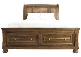 Check out platform beds with drawers at the end or bookcase beds that feature drawers to hold spare sheets and pajamas and shelves to display books and trinkets. Flynnter Queen Storage Bed Ivan Smith Furniture