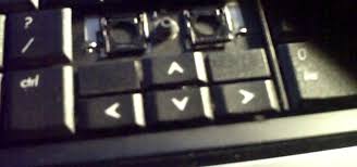 Insert a flat object below the key, such as a small flathead screwdriver or a car key, as shown in the picture. How To Clean Your Laptop S Keyboard By Removing The Keys Computer Hardware Wonderhowto