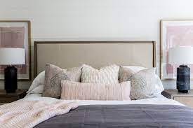 The cover is removable and slips over the duvet, and fastens at the bottom with buttons, a zipper, or ties. How To Layer Your Bedding The Right Way Layered Bedding Miya Interiors