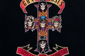 The image is the skull representing lead singer axl rose, which appeared in the center of the cross on the cover artwork for appetite for destruction. Guns N Roses Appetite For Destruction Re Enters Top 100 On Billboard Charts Guns N Roses Central Latest Guns N Roses News Videos