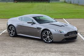 Image result for Titanium Silver 2014 Aston Martin