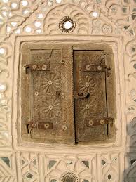They are big on heavy furniture and fittings that are still very stylish and elegant. Mud Art Of Kutch Lippan Kam Or Mud Mirror Work Mirror Work Mud House Mirror Art