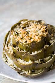 Baked Stuffed Artichokes Recipe Simplyrecipes Com Recipe Artichoke Recipes Baked Artichoke Artichoke Appetizer