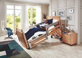 Low modern bed with footboard seating home. Inovia Care Bed The Low Height Bed Burmeier