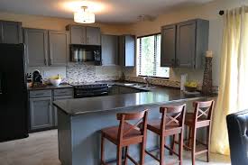 After Oak Cabinets Not The Cabinets Above The Fridge And Stove Were Raised To Add Visual Interest To The Space