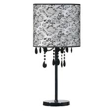 From tall and stout lamp bases to thin and thick ones, you'll not only love having a bright room to walk into, but also the way the lamp complements the rest of your home decor. Chandelier Styled Black Table Lamp Black Table Lamp Table Lamp