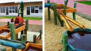 Wasserspielplatze Und Spielanlagen Zum Matschen Wasserspiel Aus Robinienholz Und Edelstahl Matschtische Und Rinnen Rhe Wasserspielplatz Wasserspiele Spielplatz