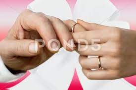 Woman S Hand Putting On A Wedding Ring On A Man S Finger Stock Photos Ad Putting Wedding Woman Hand Wedding Rings Wedding Rings