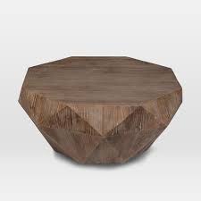 Find a variety of stylish sofa tables that provide chic storage options. Reclaimed Wood Faceted Coffee Table