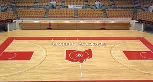 st john arena floor redone with retro hardwood floor