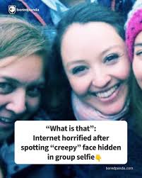 What is that”: Internet horrified after spotting “creepy” face hidden in  group selfie (link in the comments)