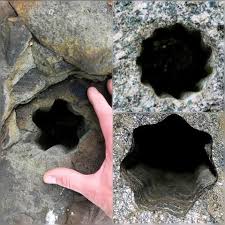 Mysterious star-shaped holes in ancient stones